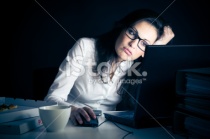 stock-photo-20306217-businesswoman-working-late